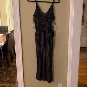 Black and White stripped romper. Cropped leg.